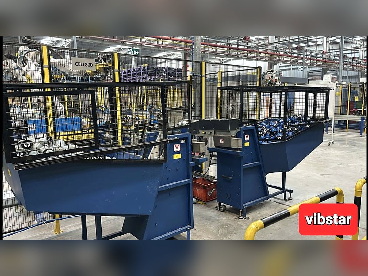 Sistema de alimentación con tolva para células robotizadas